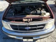 ✅ 1997 Ford F-150 • VIN: 1FTDX1765VNB84973 • Lot: 87093925. Listed on Copart with 140,179 mi. Free auction sales archive from the USA and detailed vehicle history report at DreamBid. Image 11.