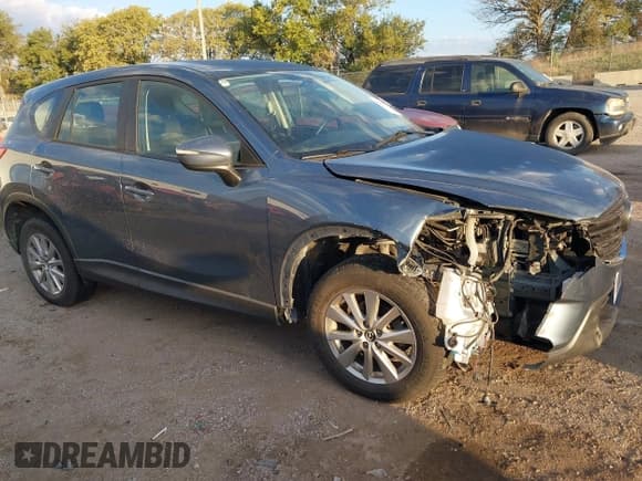 ✅ 2016 Mazda CX-5 Sport • VIN: JM3KE4BY4G0660953 • Лот: 43450266. Опубликован ранее на IAAI с пробегом 140 627 миль. Бесплатный доступ к архиву аукционных продаж из США и подробный отчёт об истории автомобиля на DreamBid. Изображение 1.