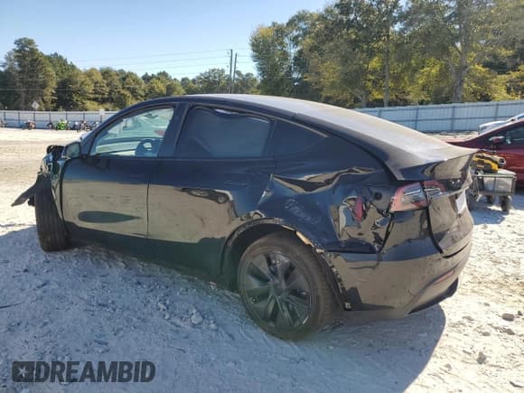 ✅ 2024 Tesla Model Y • VIN: 7SAYGDED5RA308071 • Lot: 82518185. Listed on Copart with 15,104 mi. Free auction sales archive from the USA and detailed vehicle history report at DreamBid. Image 2.