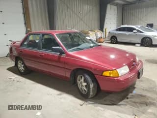 ✅ 1995 Ford Escort LX • VIN: 3FASP13J2SR157861 • Lot: 82770964. Wystawiony na Copart z przebiegiem 48 610 mil. Bezpłatny archiwum sprzedaży aukcyjnych z USA i szczegółowy raport historii pojazdu na DreamBid. Zdjęcie 4.