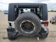 ✅ 2011 Jeep Wrangler Unlimited Rubicon • VIN: 1J4BA6H13BL537964 • Лот: 57532725. Опубликован ранее на Copart с пробегом 71 498 миль. Бесплатный доступ к архиву аукционных продаж из США и подробный отчёт об истории автомобиля на DreamBid. Изображение 6.