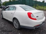 ✅ 2013 Lincoln MKS • VIN: 1LNHL9EK2DG610273 • Lot: 42877930. Wystawiony na IAAI z przebiegiem 66 889 mil. Bezpłatny archiwum sprzedaży aukcyjnych z USA i szczegółowy raport historii pojazdu na DreamBid. Zdjęcie 3.