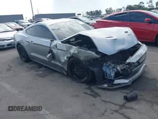 2020 Ford Mustang EcoBoost with VIN 1FA6P8TH7L5138699, listed as a IAAI auction lot 43269056 with 84,460 mi miles and . Bid and sale history available at DreamBid. Image 1.