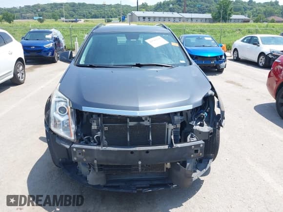 ✅ 2012 Cadillac SRX • VIN: 3GYFNGE36CS632645 • Lot: 42783135. Listed on IAAI with 175,744 mi. Free auction sales archive from the USA and detailed vehicle history report at DreamBid. Image 13.