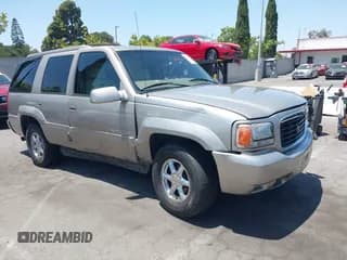 ✅ 2000 Cadillac Escalade • VIN: 1GYEK63RXYR217814 • Lot: 42528711. Listed on IAAI with 347,863 mi. Free auction sales archive from the USA and detailed vehicle history report at DreamBid. Image 1.