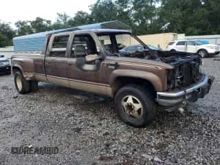 1994 Chevrolet Silverado 3500 с VIN 1GCHK33F4RJ372169, выставлен на аукционе Copart как лот 69002125 с пробегом Не указан миль и На запчасти • Non repairable. История ставок и продаж доступна на DreamBid. Изображение 4.