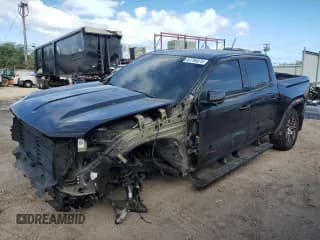 ✅ 2023 GMC Canyon 4WD AT4 • VIN: 1GTP6DEK9P1151390 • Лот: 52796875. Опубликован ранее на Copart с пробегом 19 239 миль. Бесплатный доступ к архиву аукционных продаж из США и подробный отчёт об истории автомобиля на DreamBid. Изображение 1.