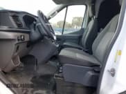 ✅ 2021 Ford Transit Cargo • VIN: 1FTBR1CG7MKA88875 • Lot: 84705324. Listed on Copart with 23,654 mi. Free auction sales archive from the USA and detailed vehicle history report at DreamBid. Image 7.