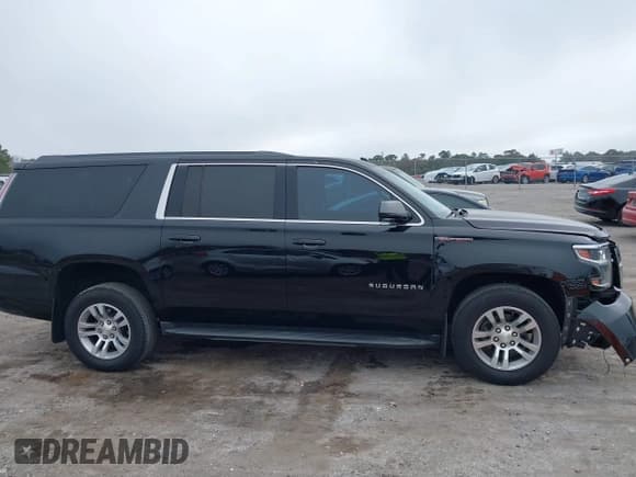 ✅ 2017 Chevrolet Suburban LS • VIN: 1GNSCGKC4HR289284 • Lot: 41503869. Listed on IAAI with 92,048 mi. Free auction sales archive from the USA and detailed vehicle history report at DreamBid. Image 13.