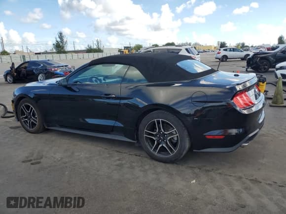 ✅ 2020 Ford Mustang EcoBoost Premium • VIN: 1FATP8UH5L5179768 • Lot: 90226595. Listed on Copart with 80,704 mi. Free auction sales archive from the USA and detailed vehicle history report at DreamBid. Image 2.