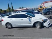✅ 2014 Ford Fusion SE Hybrid • VIN: 3FA6P0LU2ER275869 • Лот: 43023087. Опубликован ранее на IAAI с пробегом 142 038 миль. Бесплатный доступ к архиву аукционных продаж из США и подробный отчёт об истории автомобиля на DreamBid. Изображение 13.