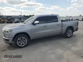 2022 Ram 1500 Limited с VIN 1C6SRFHM3NN460120, выставлен на аукционе Copart как лот 54362155 с пробегом 77 601 миль миль и Списание • Salvage title. История ставок и продаж доступна на DreamBid. Изображение 1.