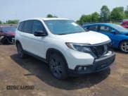 ✅ 2021 Honda Passport EX-L • VIN: 5FNYF8H59MB007097 • Lot: 42409181. Listed on IAAI with 74,410 mi. Free auction sales archive from the USA and detailed vehicle history report at DreamBid. Image 1.