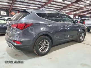 ✅ 2017 Hyundai Santa Fe 2.4L • VIN: 5XYZU3LB3HG391774 • Лот: 90070145. Опубликован ранее на Copart с пробегом 117 308 миль. Бесплатный доступ к архиву аукционных продаж из США и подробный отчёт об истории автомобиля на DreamBid. Изображение 3.
