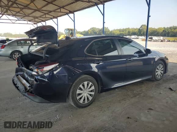 2021 Toyota Camry Hybrid LE with VIN 4T1C31AK6MU562652, listed as a Copart auction lot 69326545 with 153,540 mi miles and Salvage title. Bid and sale history available at DreamBid. Image 3.