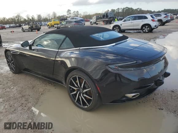 ✅ 2020 Aston Martin DB11 • VIN: SCFRMFCW6LGM09132 • Лот: 85471884. Опубликован ранее на Copart с пробегом Не указан. Бесплатный доступ к архиву аукционных продаж из США и подробный отчёт об истории автомобиля на DreamBid. Изображение 2.