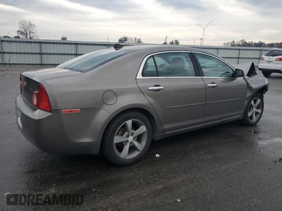 ✅ 2012 Chevrolet Malibu 1LT • VIN: 1G1ZC5E0XCF148199 • Lot: 82519784. Listed on Copart with 248,027 mi. Free auction sales archive from the USA and detailed vehicle history report at DreamBid. Image 3.