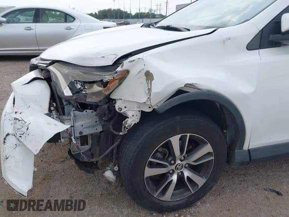 ✅ 2018 Toyota RAV4 XLE • VIN: 2T3WFREV7JW408560 • Lot: 42296818. Listed on IAAI with 130,493 mi. Free auction sales archive from the USA and detailed vehicle history report at DreamBid. Image 6.