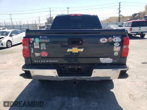 ✅ 2018 Chevrolet Silverado 1500 LT • VIN: 3GCPCREC6JG575679 • Лот: 71061974. Опубликован ранее на Copart с пробегом 127 003 миль. Бесплатный доступ к архиву аукционных продаж из США и подробный отчёт об истории автомобиля на DreamBid. Изображение 6.