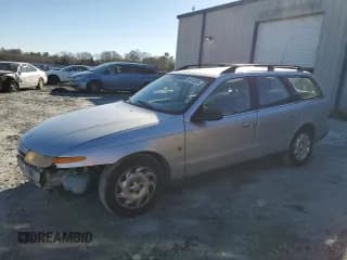 ✅ 2001 Saturn LW • VIN: 1G8JU82F31Y506377 • Lot: 89013205. Listed on Copart with 142,166 mi. Free auction sales archive from the USA and detailed vehicle history report at DreamBid. Image 1.