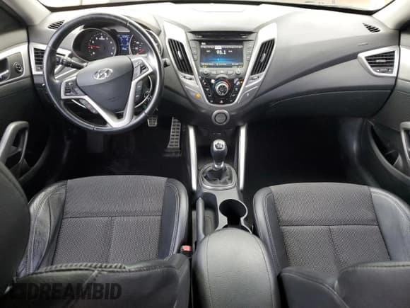 ✅ 2013 Hyundai Veloster w/Gray Int • VIN: KMHTC6ADXDU156677 • Lot: 79303324. Wystawiony na Copart z przebiegiem 72 584 mil. Bezpłatny archiwum sprzedaży aukcyjnych z USA i szczegółowy raport historii pojazdu na DreamBid. Zdjęcie 8.