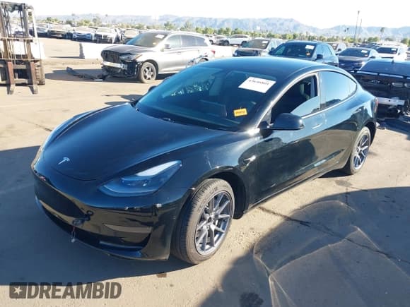 ✅ 2021 Tesla Model 3 Standard Range Plus • VIN: 5YJ3E1EA8MF930242 • Лот: 43646801. Опубликован ранее на IAAI с пробегом 18 850 миль. Бесплатный доступ к архиву аукционных продаж из США и подробный отчёт об истории автомобиля на DreamBid. Изображение 18.