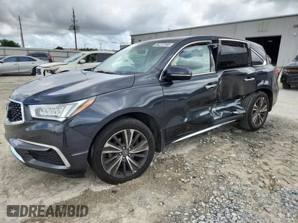 ✅ 2019 Acura MDX Technology • VIN: 5J8YD3H50KL000687 • Lot: 64272165. Listed on Copart with 97,602 mi. Free auction sales archive from the USA and detailed vehicle history report at DreamBid. Image 1.