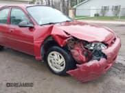 ✅ 1999 Ford Escort SE • VIN: 1FAFP13P5XW228965 • Lot: 42023231. Wystawiony na IAAI z przebiegiem 99 184 mil. Bezpłatny archiwum sprzedaży aukcyjnych z USA i szczegółowy raport historii pojazdu na DreamBid. Zdjęcie 6.