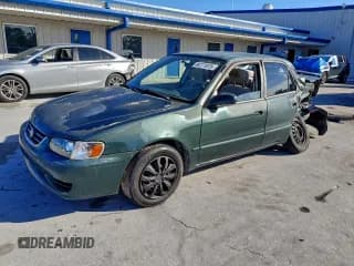 ✅ 2001 Toyota Corolla LE • VIN: 2T1BR12E51C459786 • Лот: 94771075. Опубликован ранее на Copart с пробегом 65 004 миль. Бесплатный доступ к архиву аукционных продаж из США и подробный отчёт об истории автомобиля на DreamBid. Изображение 1.