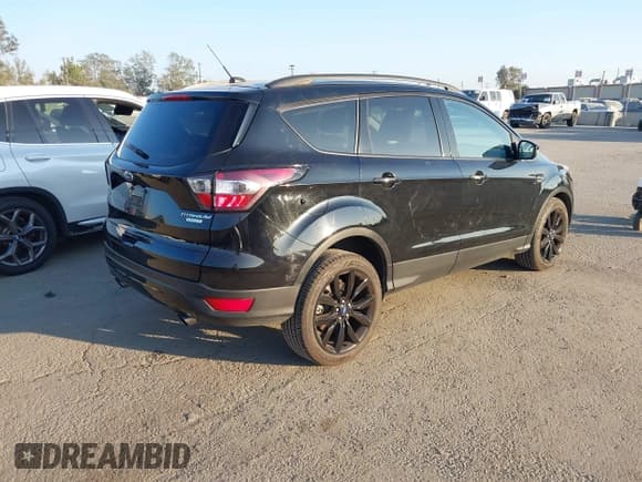 ✅ 2017 Ford Escape Titanium • VIN: 1FMCU0J97HUE96624 • Лот: 43642510. Опубликован ранее на IAAI с пробегом 63 216 миль. Бесплатный доступ к архиву аукционных продаж из США и подробный отчёт об истории автомобиля на DreamBid. Изображение 4.