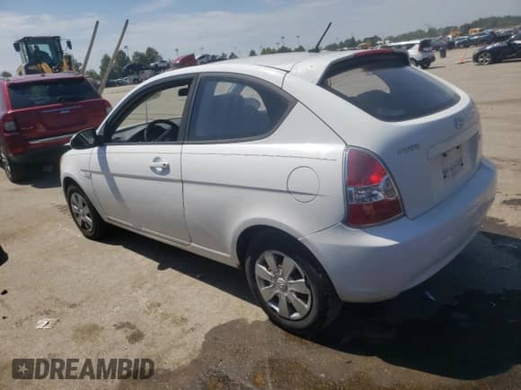 2007 Hyundai Accent GS with VIN KMHCM36C27U030166, listed as a Copart auction lot 67738154 with 174,856 mi miles and Salvage title. Bid and sale history available at DreamBid. Image 2.