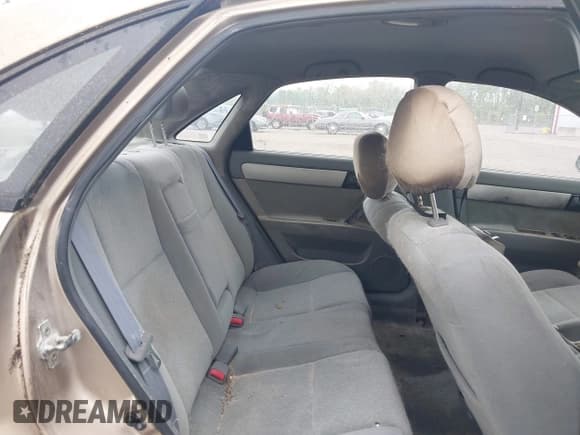 ✅ 2004 Suzuki Forenza S • VIN: KL5JD52Z24K995110 • Lot: 41909662. Listed on IAAI with 110,274 mi. Free auction sales archive from the USA and detailed vehicle history report at DreamBid. Image 8.