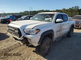 ✅ 2023 Toyota Tacoma Trail Edition • VIN: 3TYCZ5AN0PT129863 • Лот: 86168055. Опубликован ранее на Copart с пробегом 45 353 миль. Бесплатный доступ к архиву аукционных продаж из США и подробный отчёт об истории автомобиля на DreamBid. Изображение 1.