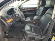 ✅ 2013 Lincoln MKT EcoBoost • VIN: 2LMHJ5AT6DBL58570 • Lot: 74689904. Wystawiony na Copart z przebiegiem 179 522 mil. Bezpłatny archiwum sprzedaży aukcyjnych z USA i szczegółowy raport historii pojazdu na DreamBid. Zdjęcie 7.