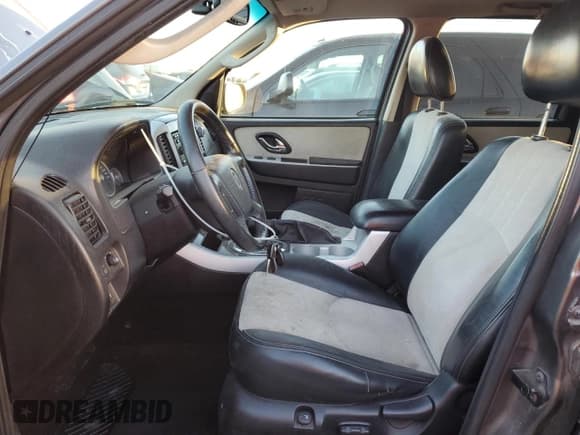 ✅ 2006 Mercury Mariner Luxury • VIN: 4M2YU56116DJ00009 • Лот: 75915244. Опубликован ранее на Copart с пробегом 193 902 миль. Бесплатный доступ к архиву аукционных продаж из США и подробный отчёт об истории автомобиля на DreamBid. Изображение 7.