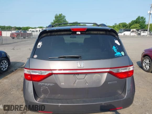 ✅ 2012 Honda Odyssey Touring • VIN: 5FNRL5H92CB059118 • Lot: 42415626. Listed on IAAI with 171,513 mi. Free auction sales archive from the USA and detailed vehicle history report at DreamBid. Image 16.