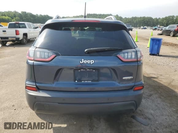 ✅ 2020 Jeep Cherokee Altitude • VIN: 1C4PJLLB4LD653986 • Lot: 66932065. Listed on Copart with 99,629 mi. Free auction sales archive from the USA and detailed vehicle history report at DreamBid. Image 6.