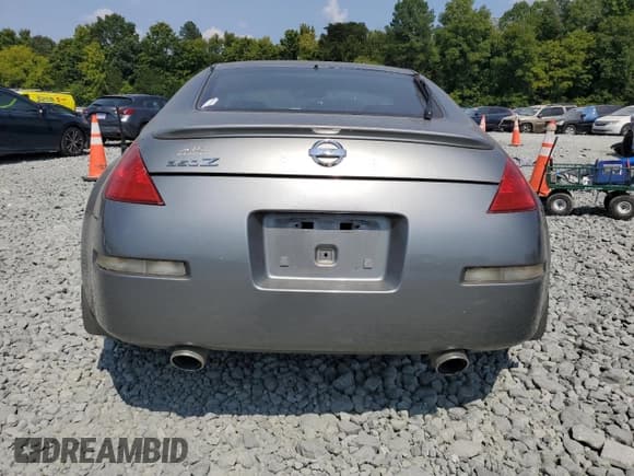 ✅ 2005 Nissan 350Z • VIN: JN1AZ34D85M608232 • Лот: 69145384. Опубликован ранее на Copart с пробегом 128 199 миль. Бесплатный доступ к архиву аукционных продаж из США и подробный отчёт об истории автомобиля на DreamBid. Изображение 6.
