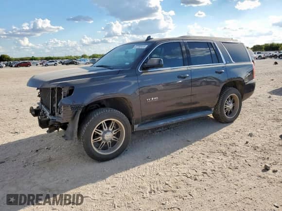 2015 Chevrolet Tahoe LT z VIN 1GNSCBKC9FR633675, wystawiony jako Copart lot #81702415 z przebiegiem 153 617 mil mil oraz Szkoda całkowita • Salvage title. Historia ofert i sprzedaży dostępna na DreamBid. Obrazek 1.