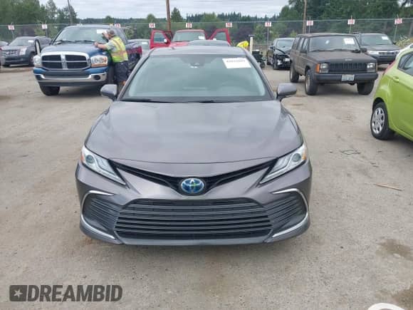 2022 Toyota Camry Hybrid XLE with VIN 4T1F31AK6NU575433, listed as a IAAI auction lot 42841689 with 65,526 mi miles and . Bid and sale history available at DreamBid. Image 12.