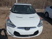 ✅ 2014 Hyundai Veloster • VIN: KMHTC6AD6EU194151 • Lot: 41775835. Wystawiony na IAAI z przebiegiem 111 136 mil. Bezpłatny archiwum sprzedaży aukcyjnych z USA i szczegółowy raport historii pojazdu na DreamBid. Zdjęcie 6.