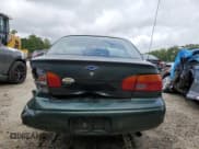 ✅ 2000 Chevrolet Prizm • VIN: 1Y1SK5284YZ411021 • Lot: 66666935. Listed on Copart with 137,188 mi. Free auction sales archive from the USA and detailed vehicle history report at DreamBid. Image 6.