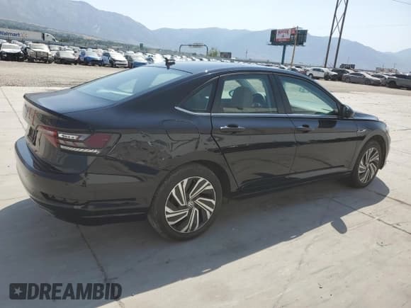 ✅ 2021 Volkswagen Jetta SEL • VIN: 3VWE57BU5MM013374 • Лот: 65150905. Опубликован ранее на Copart с пробегом 50 969 миль. Бесплатный доступ к архиву аукционных продаж из США и подробный отчёт об истории автомобиля на DreamBid. Изображение 3.