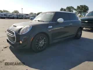 2014 MINI Hardtop S with VIN WMWXM7C59ET987820, listed as a Copart auction lot 59164955 with 77,699 mi miles and Salvage title. Bid and sale history available at DreamBid. Image 1.