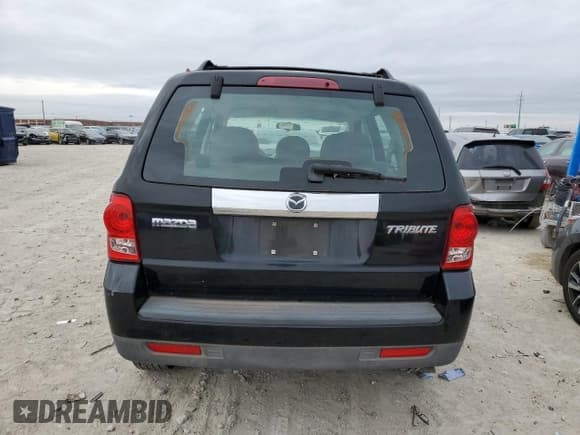 ✅ 2009 Mazda Tribute Touring • VIN: 4F2CZ02739KM03047 • Lot: 43086245. Wystawiony na Copart z przebiegiem 164 566 mil. Bezpłatny archiwum sprzedaży aukcyjnych z USA i szczegółowy raport historii pojazdu na DreamBid. Zdjęcie 6.