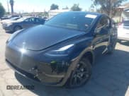 ✅ 2025 Tesla Model Y Long Range • VIN: 7SAYGDED5SF248415 • Лот: 43464829. Опубликован ранее на IAAI с пробегом 18 306 миль. Бесплатный доступ к архиву аукционных продаж из США и подробный отчёт об истории автомобиля на DreamBid. Изображение 2.