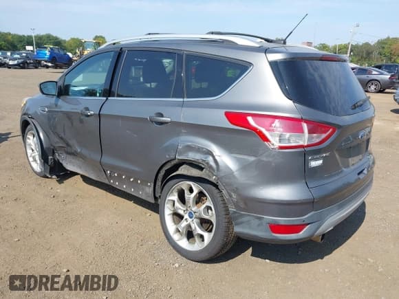 ✅ 2013 Ford Escape Titanium • VIN: 1FMCU9J99DUB51397 • Lot: 43286662. Listed on IAAI with 133,274 mi. Free auction sales archive from the USA and detailed vehicle history report at DreamBid. Image 18.