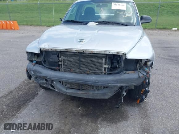 ✅ 2004 Dodge Dakota • VIN: 1D7FL16K04S554963 • Lot: 40128365. Wystawiony na IAAI z przebiegiem 72 818 mil. Bezpłatny archiwum sprzedaży aukcyjnych z USA i szczegółowy raport historii pojazdu na DreamBid. Zdjęcie 6.