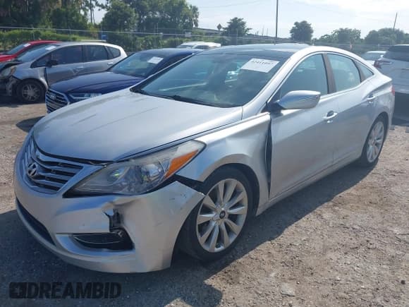 ✅ 2013 Hyundai Azera • VIN: KMHFH4JG8DA308809 • Лот: 42411097. Опубликован ранее на IAAI с пробегом 90 594 миль. Бесплатный доступ к архиву аукционных продаж из США и подробный отчёт об истории автомобиля на DreamBid. Изображение 2.