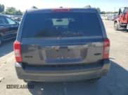 ✅ 2015 Jeep Patriot Latitude • VIN: 1C4NJPFA8FD157594 • Lot: 82190415. Listed on Copart with 142,150 mi. Free auction sales archive from the USA and detailed vehicle history report at DreamBid. Image 6.